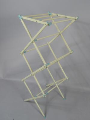 A mid-20thC cream painted metal and blue plastic folding clothes horse