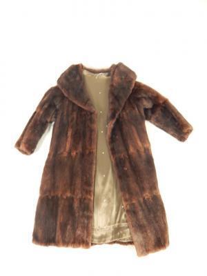 A lady's three quarter length musquash fur coat.