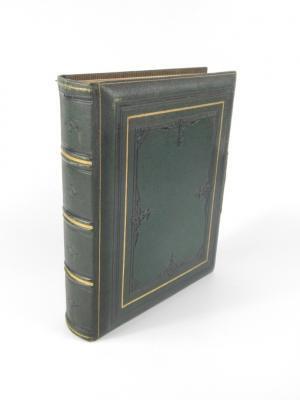 A Victorian gilt tooled green Morocco portrait photograph album