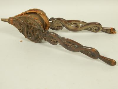 A pair of late 19th/early 20thC carved wooden long handled bellows