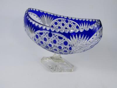 A Continental blue flashed glass pedestal fruit bowl