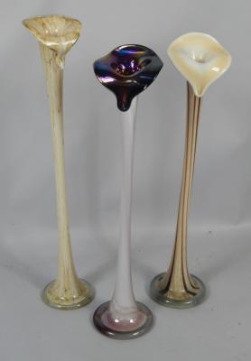 Three elongated coloured glass Jack-in-the-pulpit vases