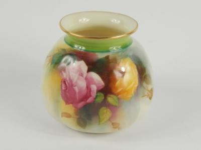 A Royal Worcester porcelain vase painted with roses