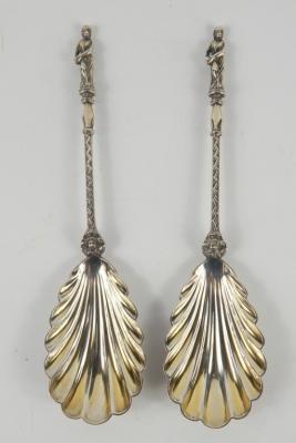 A pair of Victorian silver fluted fruit spoons