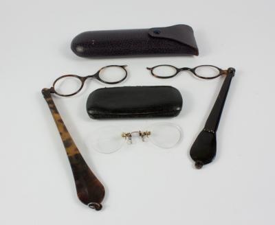 A pair of pince-nez and two pairs of lorgnettes