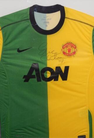 Eric Cantona. A hand signed Manchester United shirt