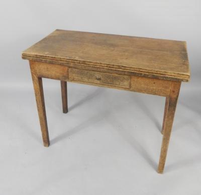 An oak fold over tea table