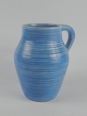 A Clarice Cliff turquoise blue ribbed pottery jug