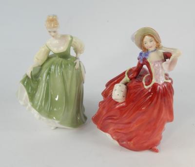 A Royal Doulton figure modelled as Autumn Breezes