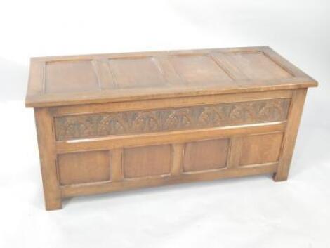 A Reprodux oak panelled coffer