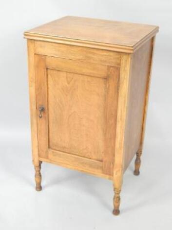 An early 20thC oak pot cupboard