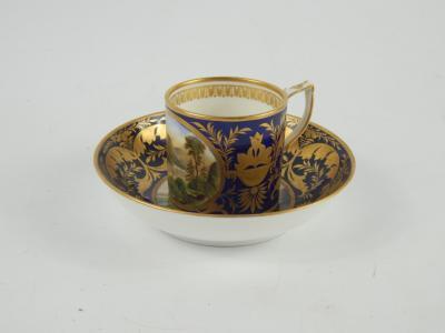 A Crown Derby early 19thC porcelain coffee can and saucer