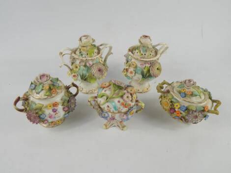 A pair of Coalbrookdale early 19thC porcelain pot pourri vases and covers