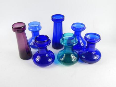 Seven Victorian Bristol Blue turquoise and amethyst glass hyacinth vases.