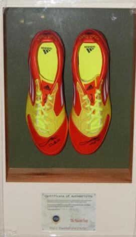 A pair of Lionel Messi signed football boots