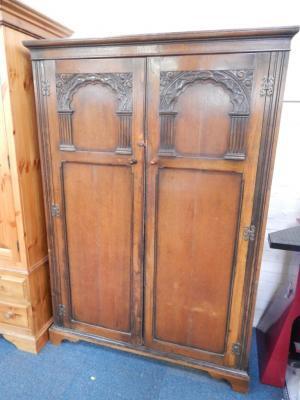 An oak double wardrobe