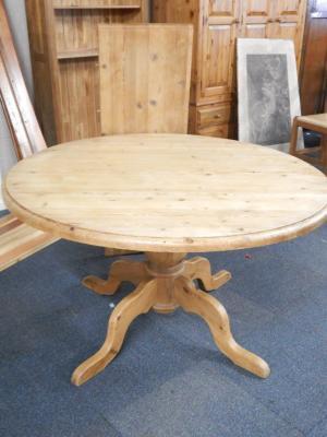 A circular pine breakfast table