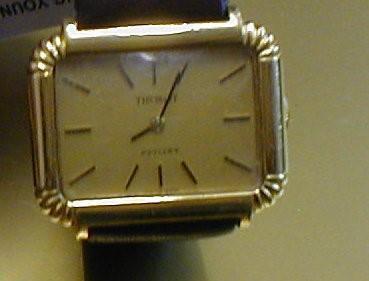 A mid size gold plated Tissot rectangular wristwatch with gold coloured