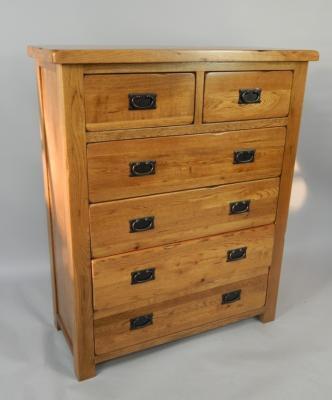 An oak chest of drawers