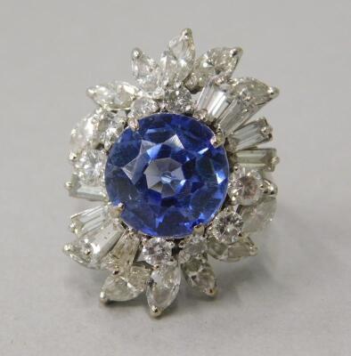 A diamond and sapphire (possibly synthetic) dress ring