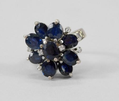 An 18ct white gold sapphire and diamond dress ring