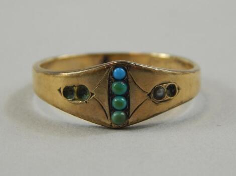 A turquoise set dress ring