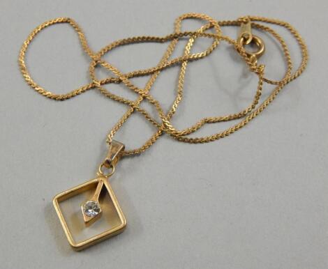 A modern pendant and chain