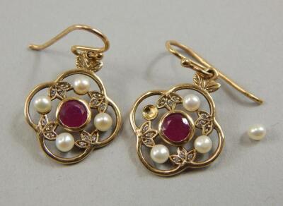 A pair of 9ct gold garnet and seed pearl earrings