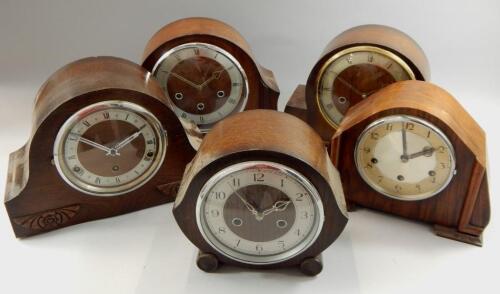 Five mid 20thC walnut and oak mantel clocks