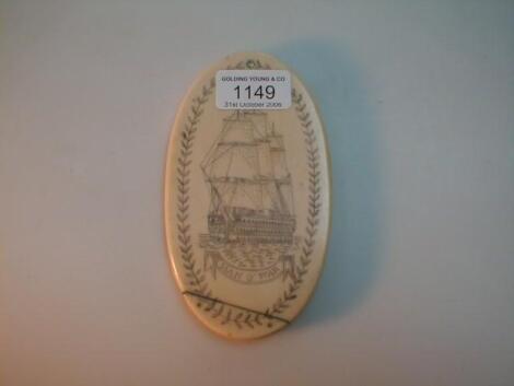 An ivory pocket mirror with a Scrimshaw "MAN-O-WAR" cover and bearing inscription