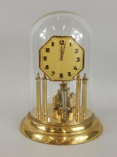 A brass anniversary type clock