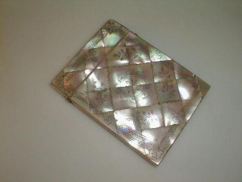 A Victorian mother of pearl calling card case