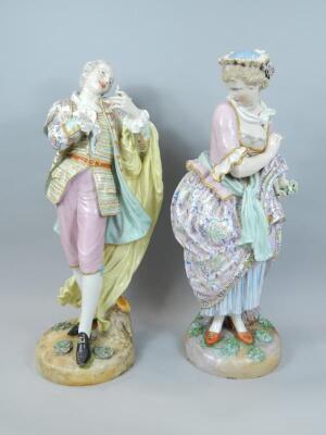 A pair of Dresden porcelain figures