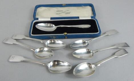 A collection of silver spoons