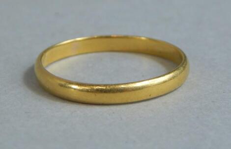 A 22ct gold wedding band