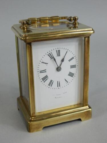 A 20thC French brass carriage timepiece