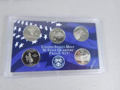 A USA 2007 set of 14 proof coins and a UK set of ten proof coins from the year 2000 - 3