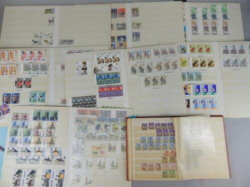 Various small stamp albums and an album of definitives