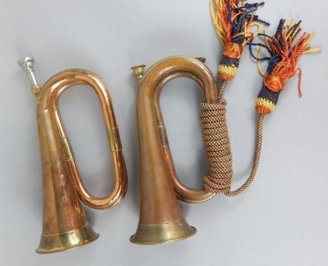 Two copper and brass military style bugles