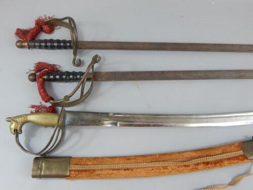 Three reproduction brass and metal swords