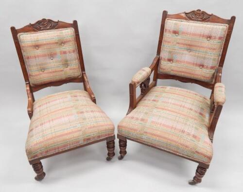 A pair of Edwardian walnut salon type chairs