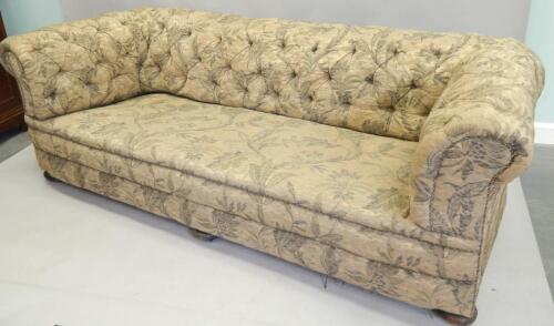 A large Victorian Chesterfield sofa