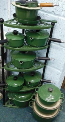 A Le Creuset part cooking set in green