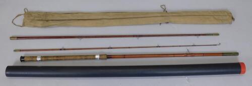 A three piece fibre glass fishing rod