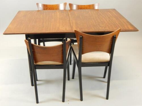 A retro style G Plan type teak extending dining table