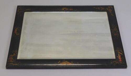 An early 20thC black japanned rectangular wall mirror