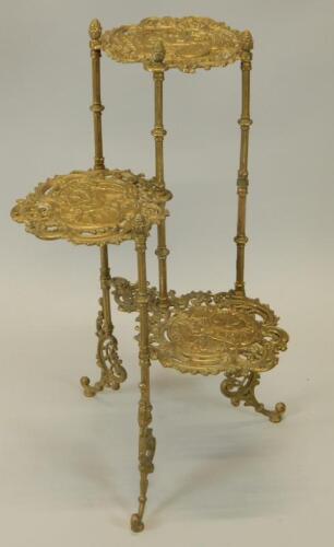 A brass three tier stand