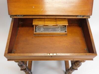 A Victorian walnut davenport - 4