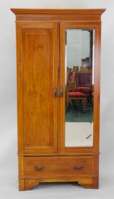 An Edwardian mahogany and satin wood cross banded wardrobe