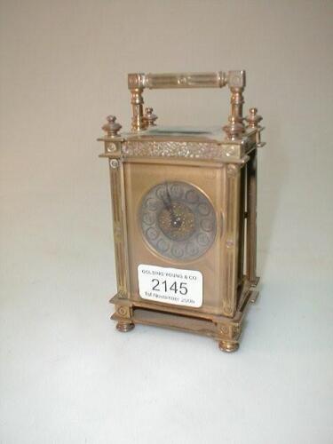 A gilt brass carriage timepiece